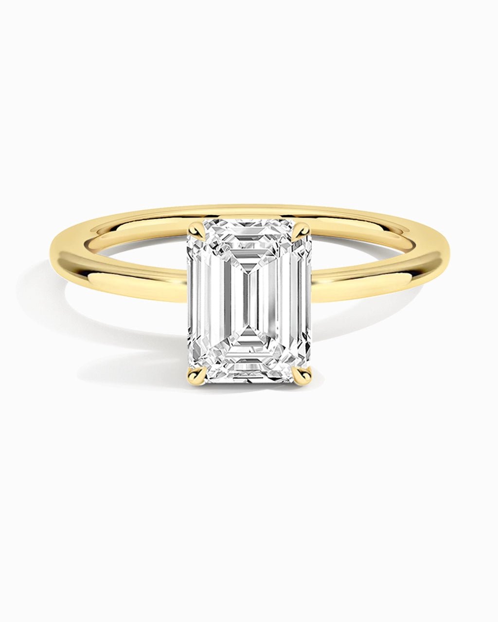 Anillo de moissanita con halo y esmeralda